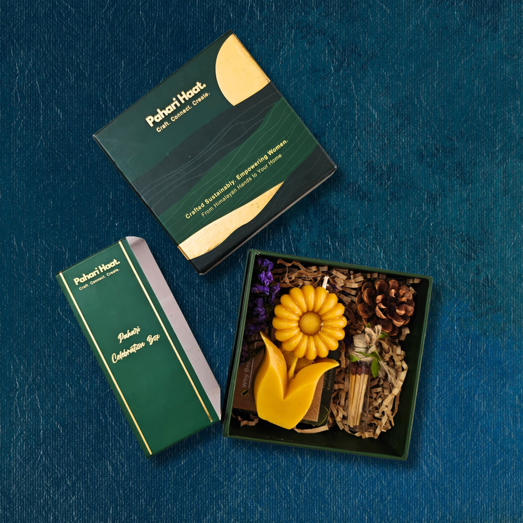 Eco-friendly gifts in India featuring Honey-Tea gift hamper, handcrafted beeswax candles, Aipan art stationery, embroidered diary and upcycled incense cones