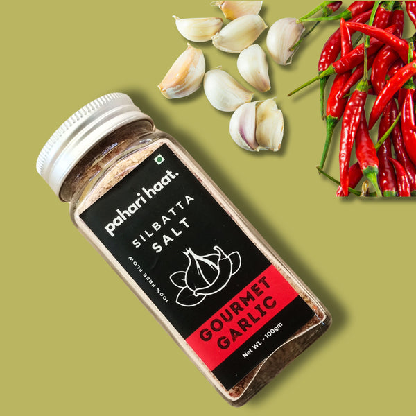 Gourmet Chilly Garlic Silbatta Salt by Pahari Haat — handcrafted Himalayan pink salt with chili and garlic.