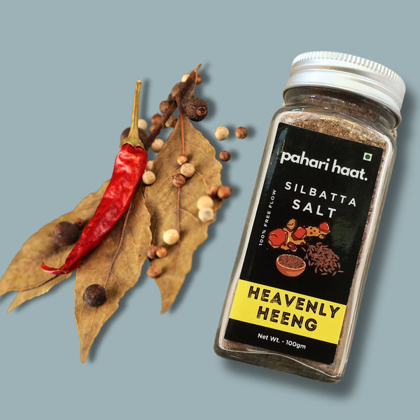 Heavenly Heeng being ground on traditional silbatta — handcrafted Himalayan spice blend.