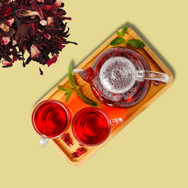 Dried hibiscus petals and rose buds — natural antioxidant herbal tea blend by Pahari Haat.