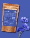 Packet of Blue Corn Flower Petals with blue flowers on a blue background